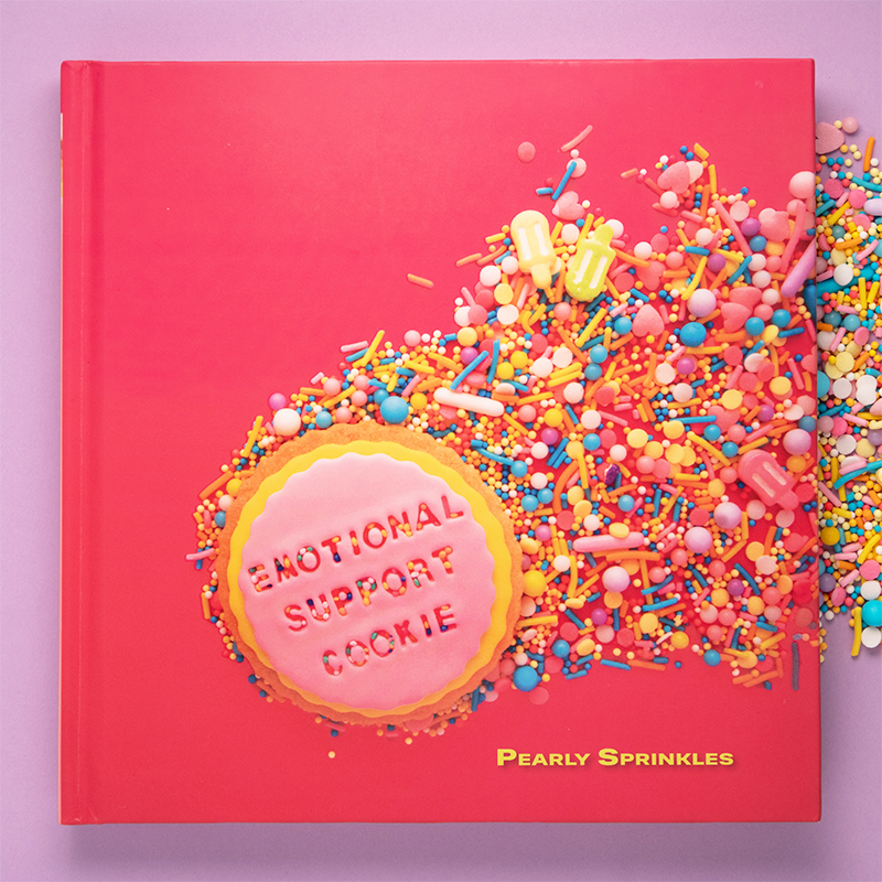 Pink book on purple background
